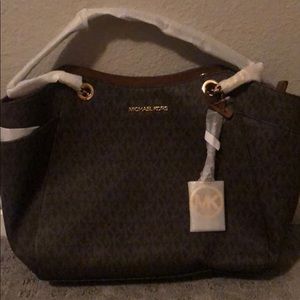 Brand new! Michael Kors jet set bag and wallet!